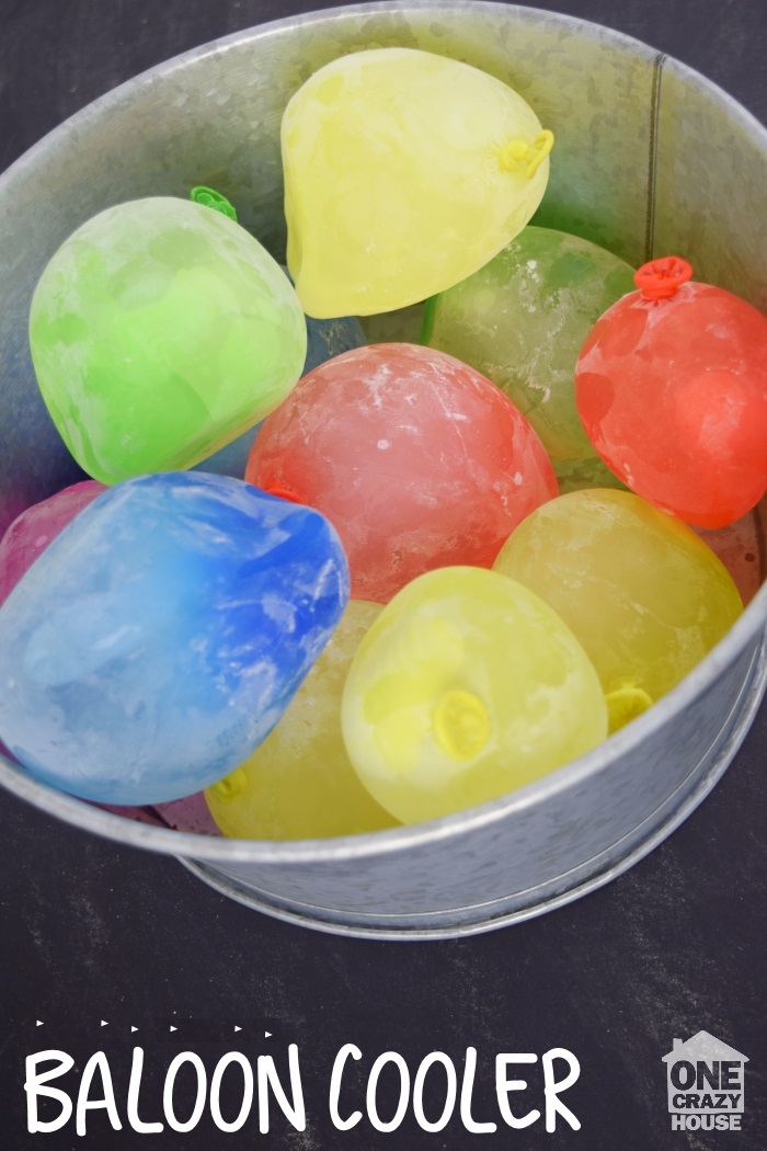 frozen balloon cooler filled with colorful balloons