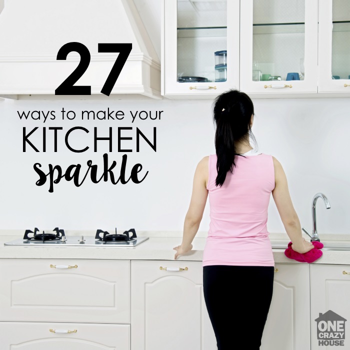 woman cleaning her kitchen while following the spring cleaning list