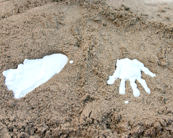 plaster of paris foot print and hand print in the sand