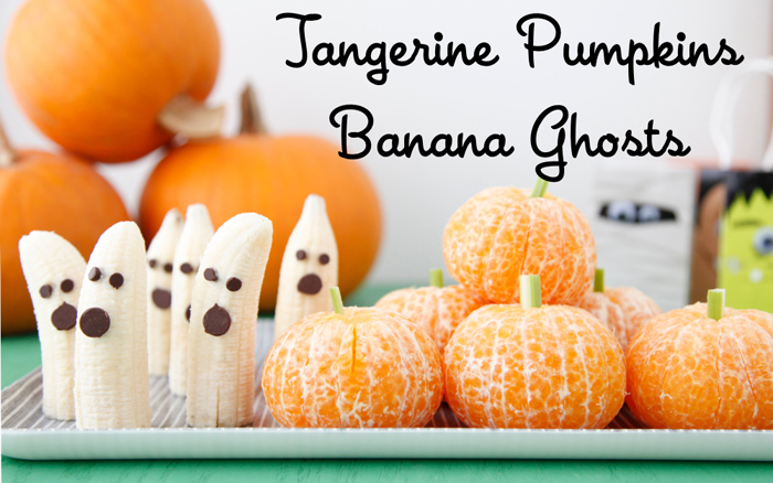 Bannana ghosts with chocolate chip eyes and tangerine pumpkins with green stems