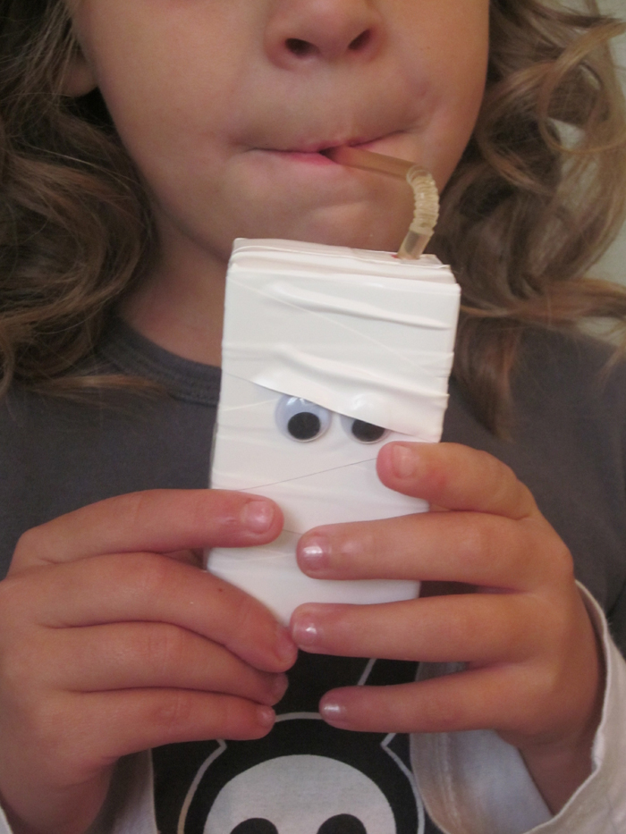 white juice boxes with eyes