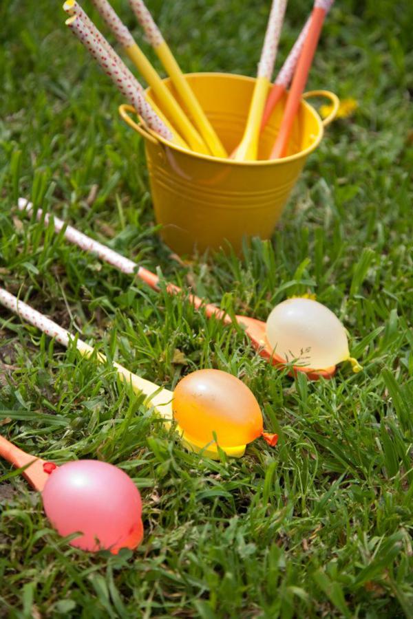 Water balloon spoon race