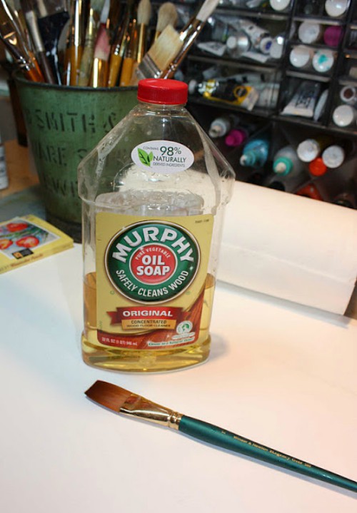 Bottle of Murphy's Oil Soap and a clean art paint brush