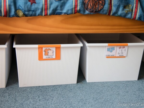 how to organize kids clothes in bins under the bed