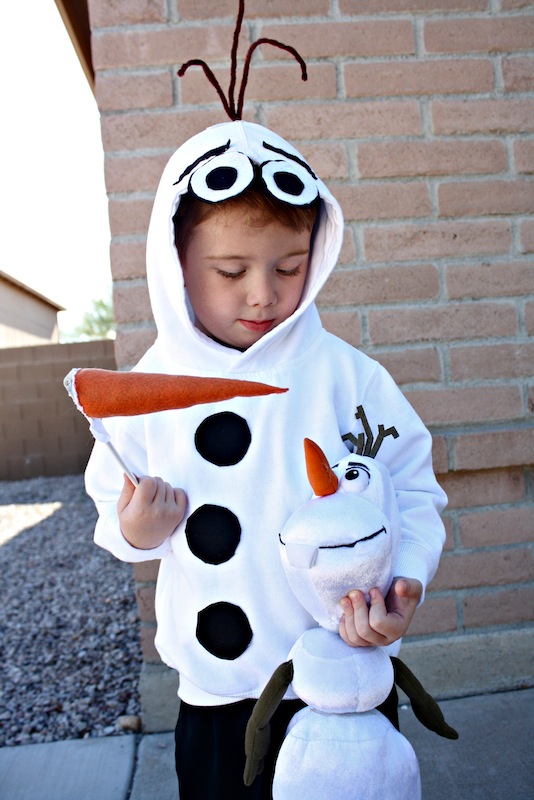 Boy dressed in homemade Olaf Costume