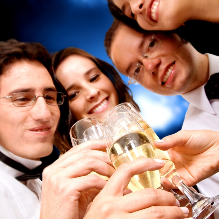 With the New Year coming up quickly, it's time to start planning out those New Years Resolutions! Here is a list of New Year Resolutions anyone can do! #NewYear #NewYearResolutions #OneCrazyHouse a group celebrating and setting new year's resolutions