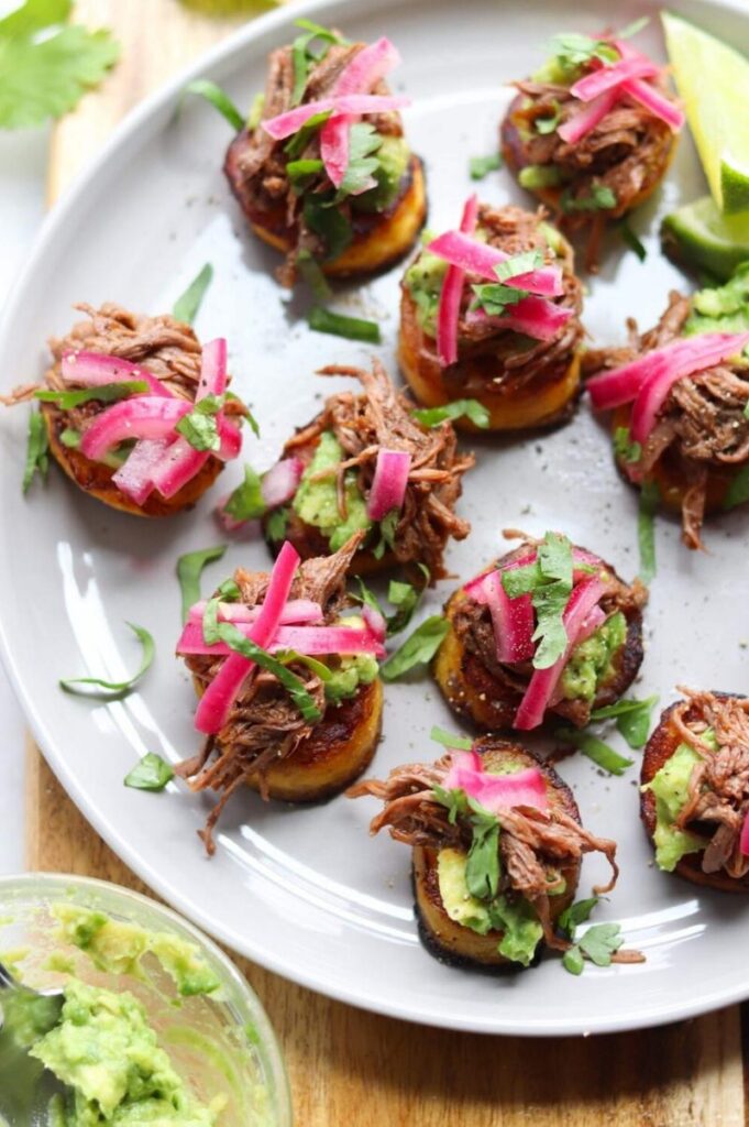 Enjoy Mexican appetizers like these Barbacoa beef and plaintain sliders