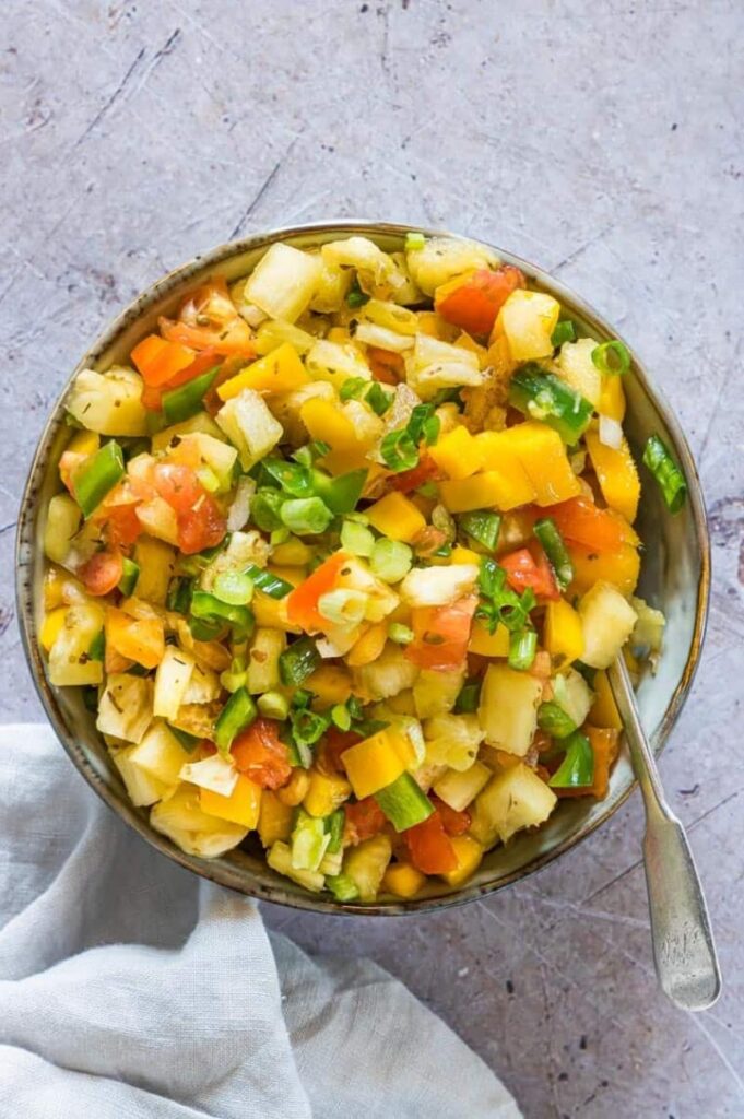 Enjoy Mexican appetizers like this easy mango pineapple salsa