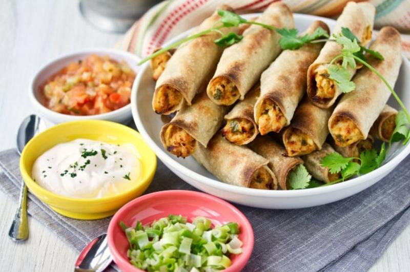 Enjoy Mexican appetizers like these taquitos