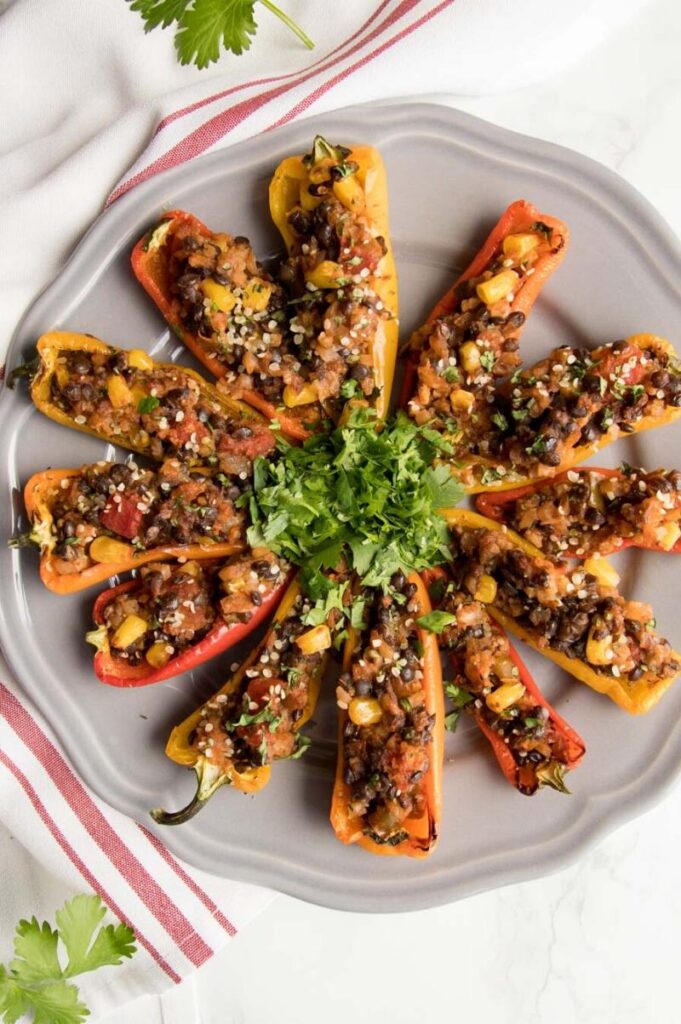 Enjoy Mexican appetizers like these mini stuffed peppers