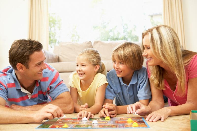 family playing board games