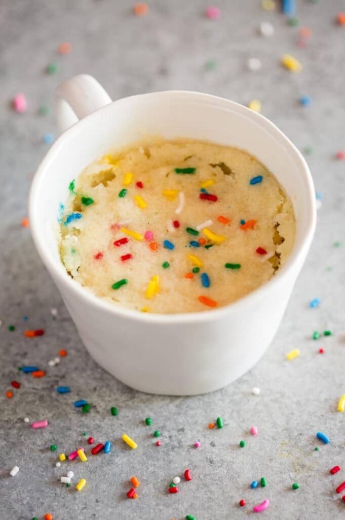 vanilla mug cake with sprinkles