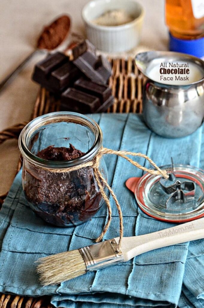 chocolate face mask in a jar on a table