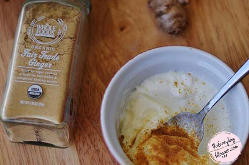 jar of ginger on a table and bowl of body wrap ingredients