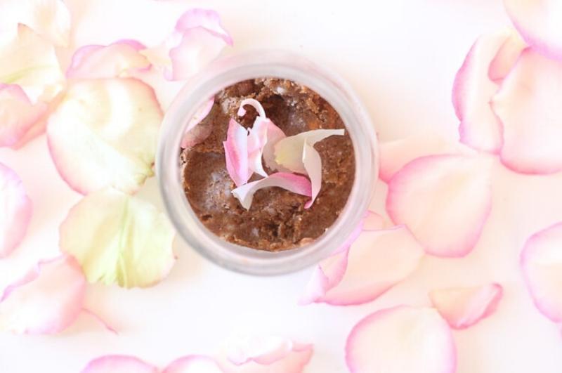 rose sugar scrub in a jar with rose petals on top