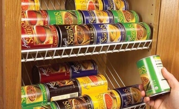 canned foods stored on a DIY closet shelf in a pantry