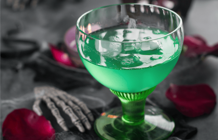 Green pucker wine in a wine glass