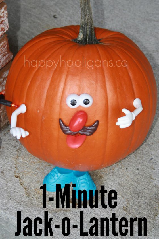 pumpkin decorated with Mr. Potato Head poke-ins.