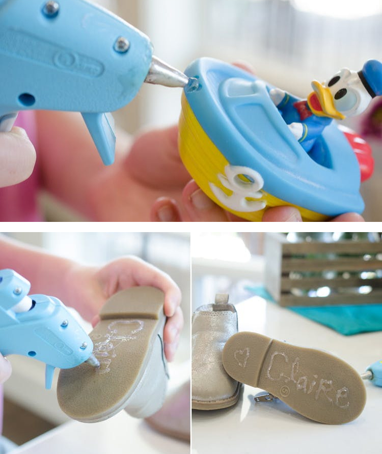hot glue gun being used to seal up the hole on a bath toy and turn kids shoes non-slip