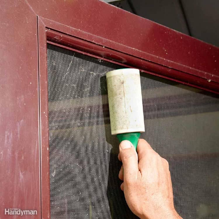 Cleaning window screens with lint roller