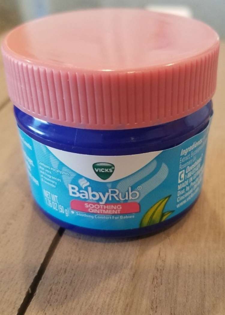 Must Try Vicks VapoRub Hacks - Vicks BabyRub jar on wooden table 