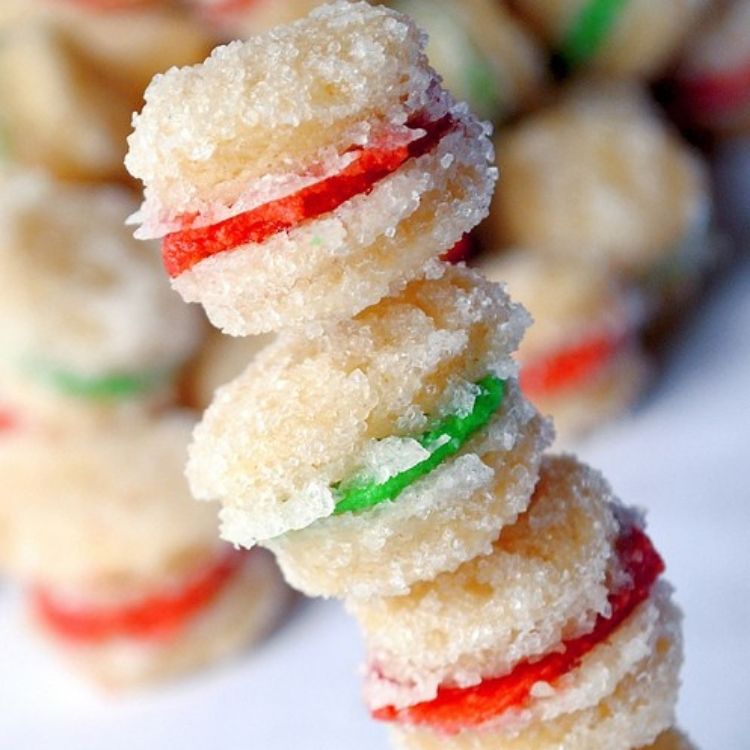 Brightly colored filling of green and red mini pill bottle cookies