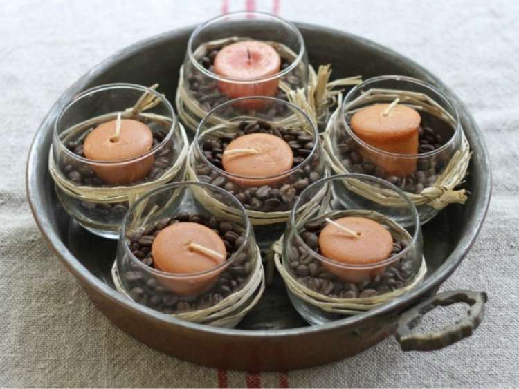 candles inside tray of coffee beans for diy fall home scents