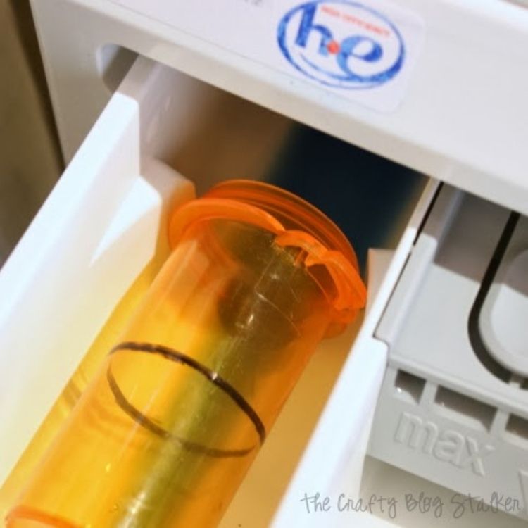 Reuse pill bottle to measure out liquid laundry soap