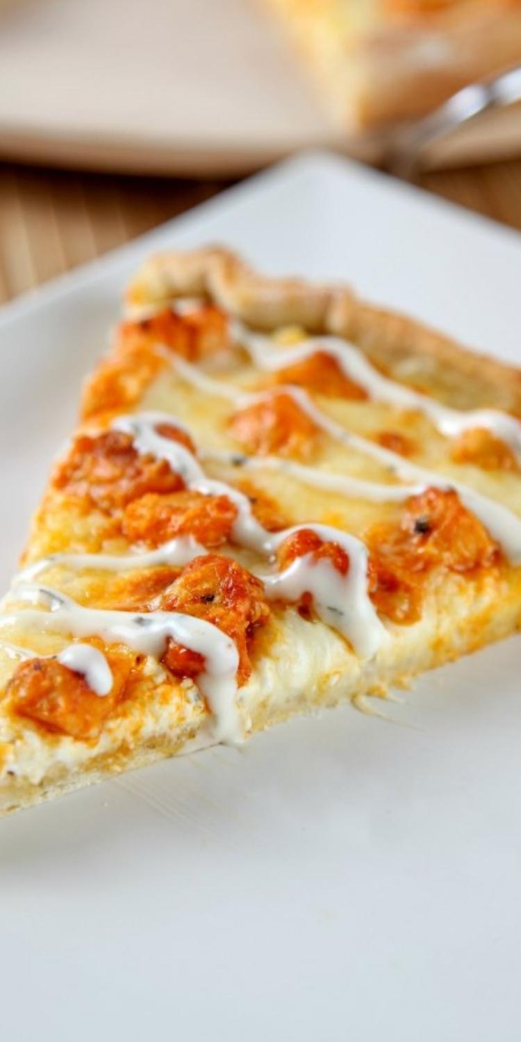 Classic Buffalo Chicken Pizza drizzled with homemade ranch. 