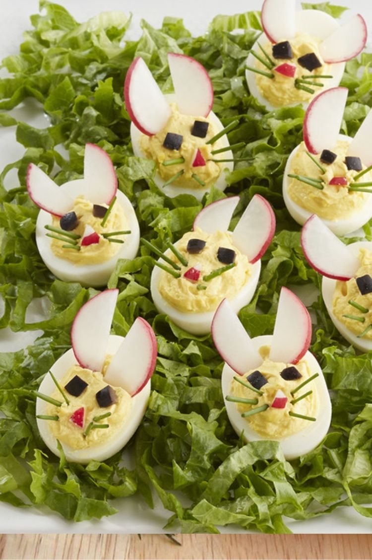 Classic deviled eggs but use almonds and other smaller edible pieces to make bunny faces on top of the eggs