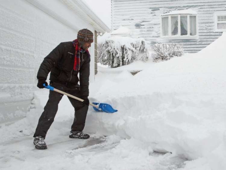 man shoveling snow