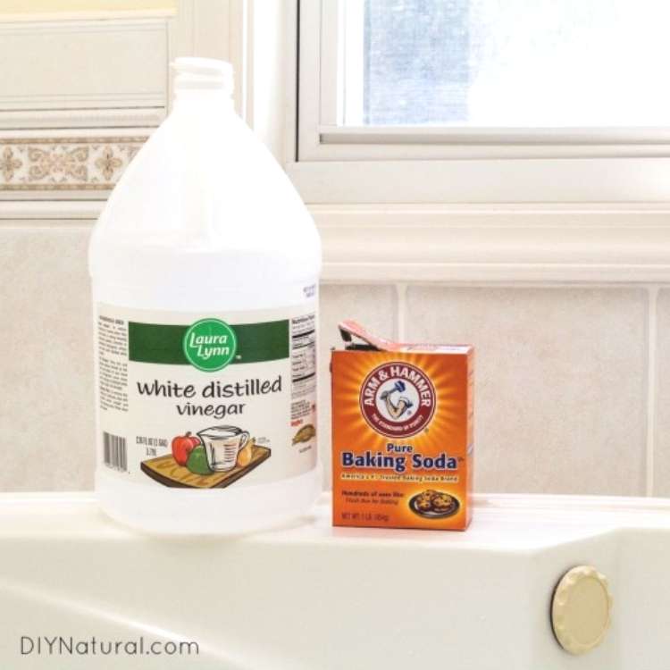 vinegar and baking soda on edge of tub