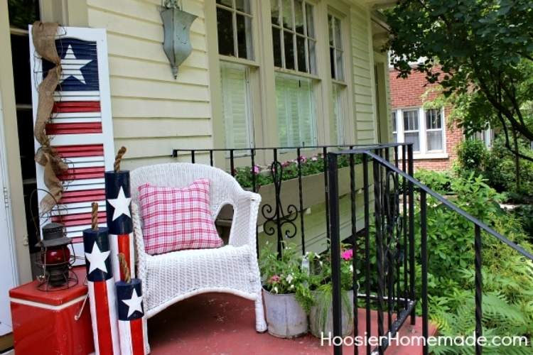 Porch display with patriotic shutter
