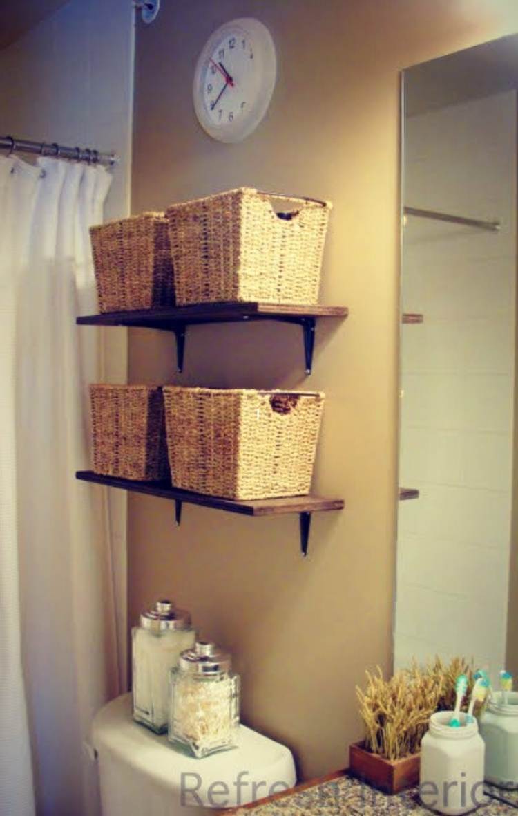 above the toilet storage shelves with baskets