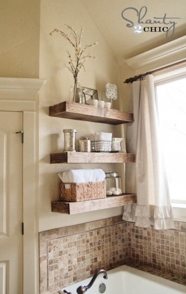 above the toilet storage with floating shelves