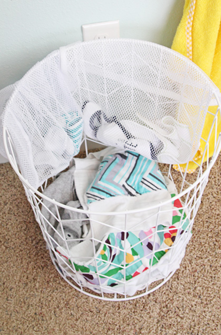 Mesh laundry bag baby clothes storage idea