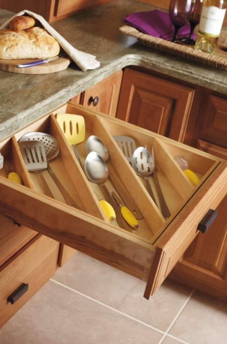 OneCrazyHouse How to Organize Kitchen Open kitchen drawer with utensil dividers insterted diagonally holding longer cooking utensils.