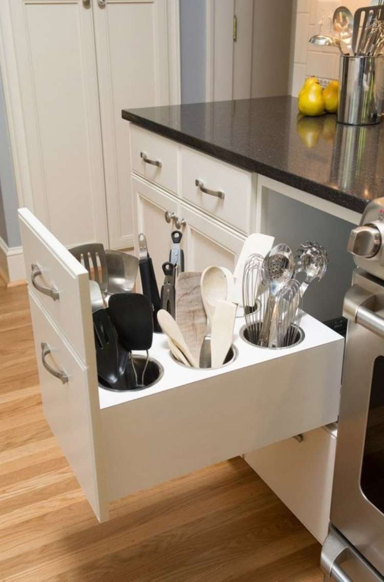 OneCrazyHouse How to Organize Kitchen Deep kitchen drawer next to stove, open, reavealing tall kitchen utensils neatly arranged standing up in drawer