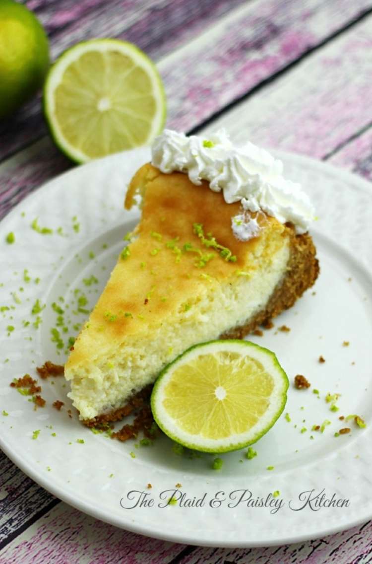 OneCrazyHouse Cheesecake Factory Copycat recipes plate of key lime cheesecake with lime slices and lime shavings