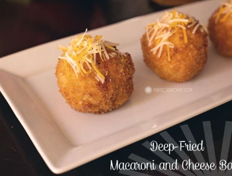 OneCrazyHouse Cheesecake Factory Copycat recipes plate of fried mac and cheese balls topped with shredded cheese