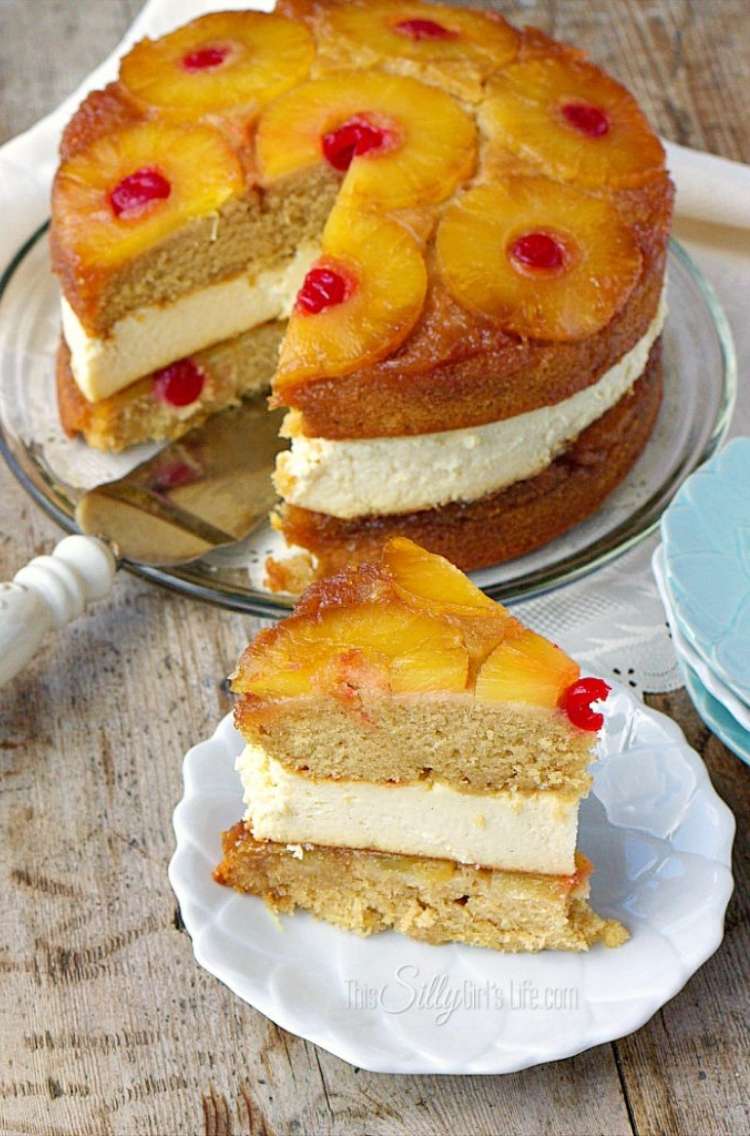 OneCrazyHouse Cheesecake Factory Copycat recipes slice of pineapple upside down cheesecake with rest of cheesecake in background.