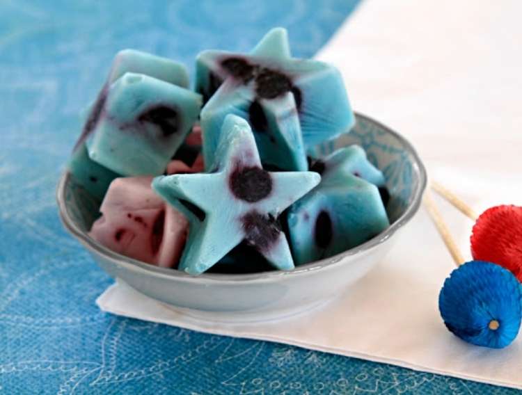 Bowl of heart shaped frozen yogurt berry treats