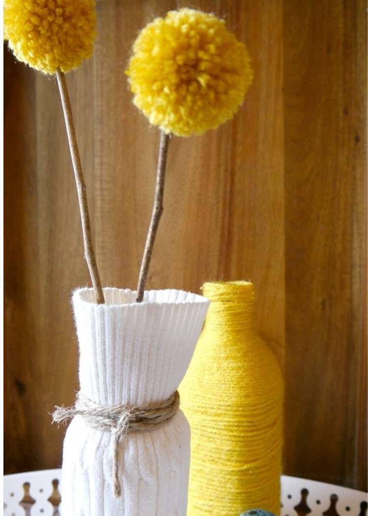 Cool sweater vase made from a bottle and recycled old sweater