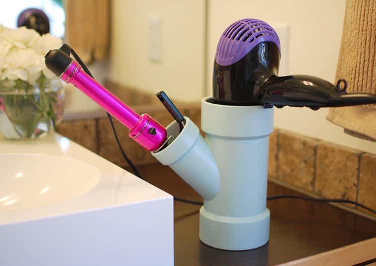 use PVC pipe to store hairdryer and curling iron
