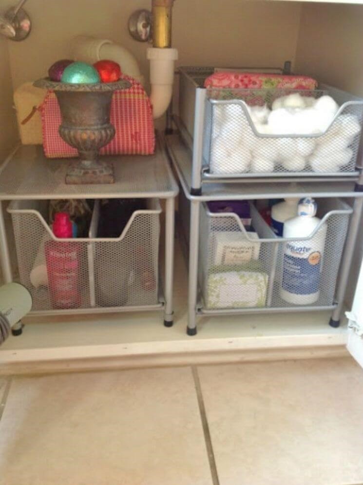 wire storage bins to organize items under the bathroom sink