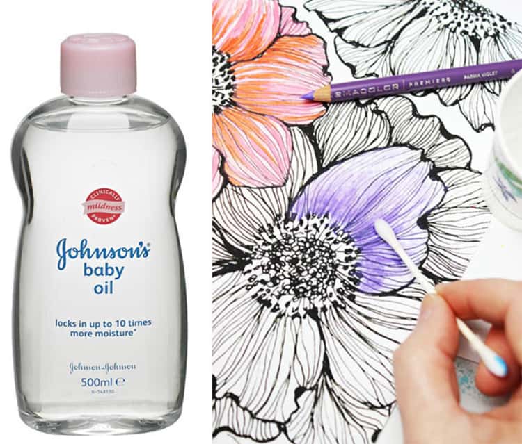 baby oil uses - 500ml of johnson's baby oil next to drawing in the process of being colored in orange and purple using the baby oil technique