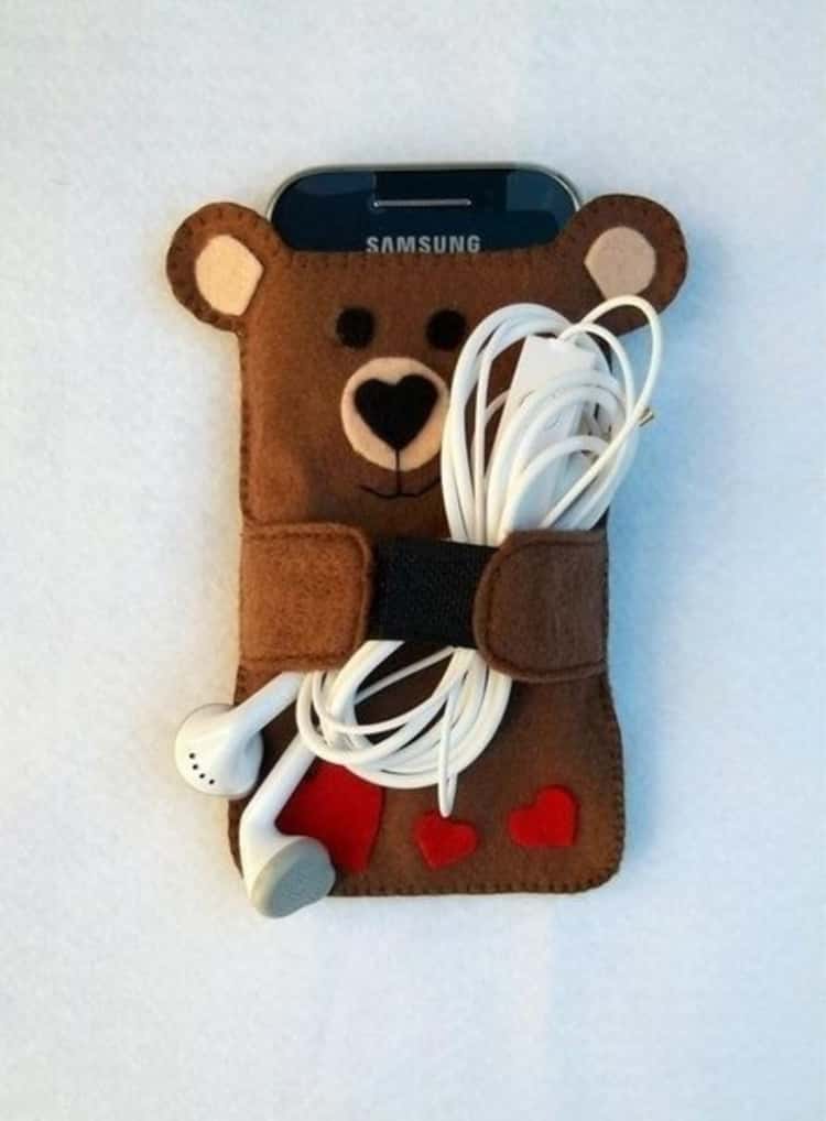 DIY felt fabric phone case and earbuds holder in the shape of a bear