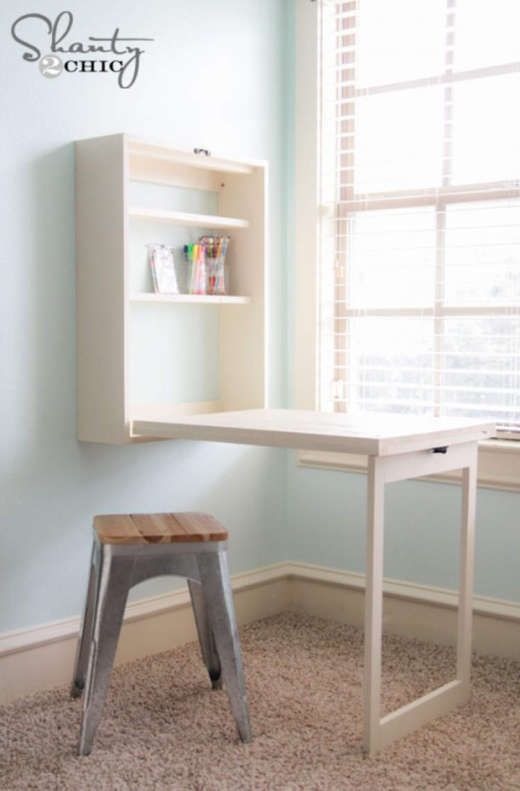 Foldaway desk being used to free up floor space when not in use.