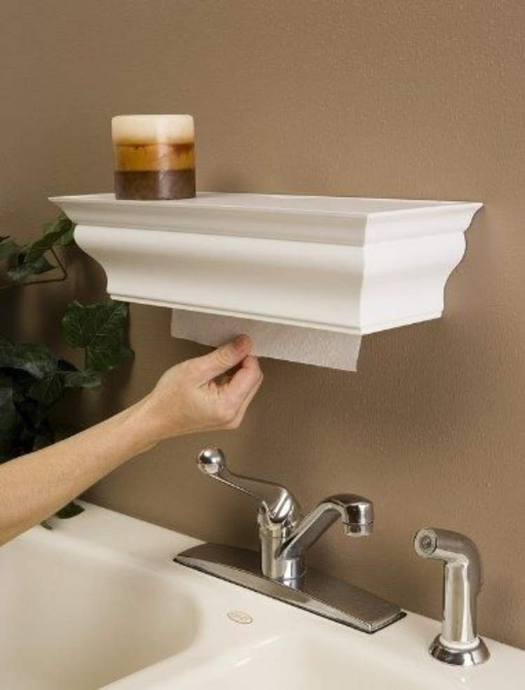 A clever shelf unit with a shelf on top to hide away the paper towels .