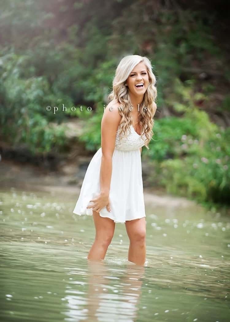 senior picture ideas for girls - happy girl in water 